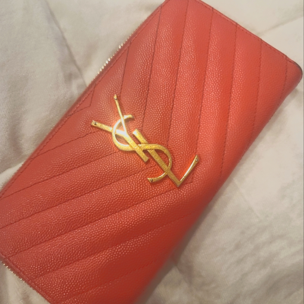 Salmon pink YSL zippy wallet